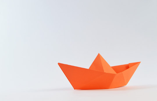 Orange paper boat