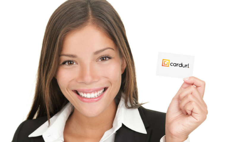 Woman holding a business card